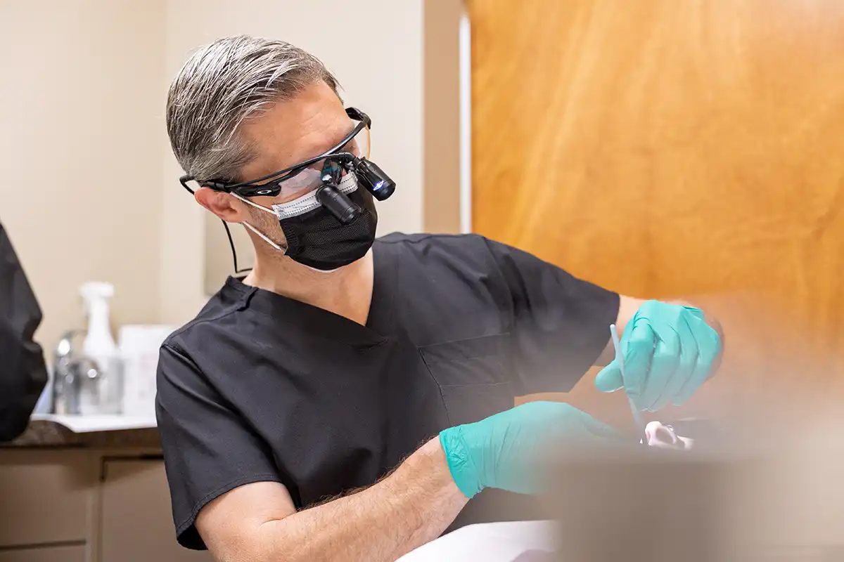 Dr. Pranckun working on a patient.